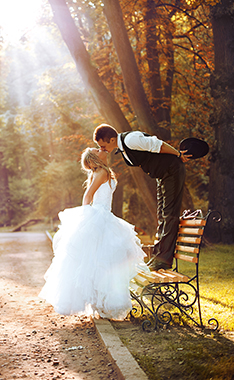 couple kissing in a park