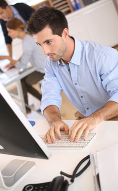 man working at a computer